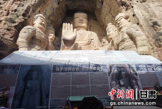 時下，中國“石窟鼻祖”天梯山石窟第13窟大佛足部與局部危巖體搶救性保護(hù)項(xiàng)目正在施工。圖為施工現(xiàn)場。陳曉斌 攝